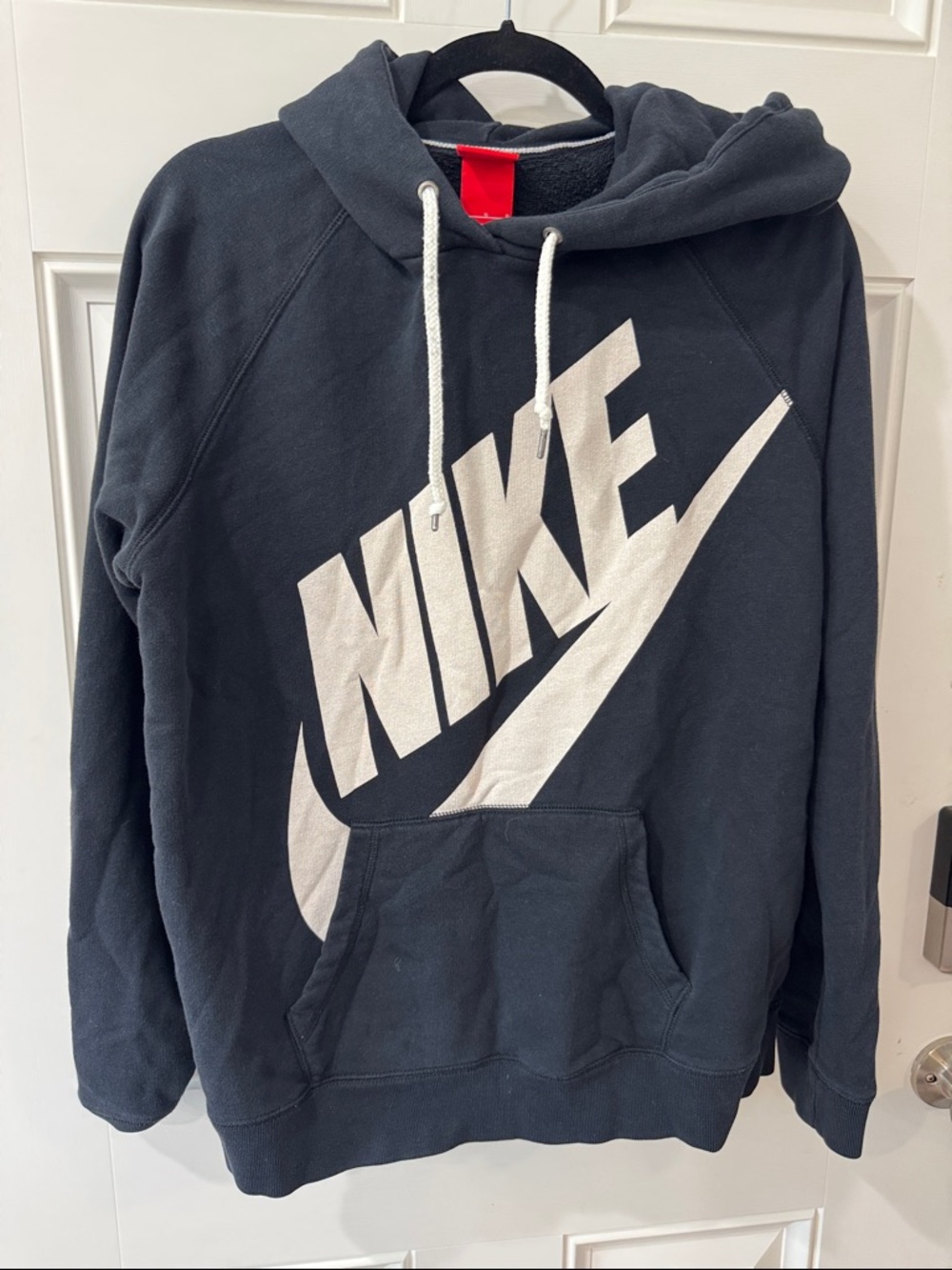 Nike Black Hoodie with Large White Swoosh Logo